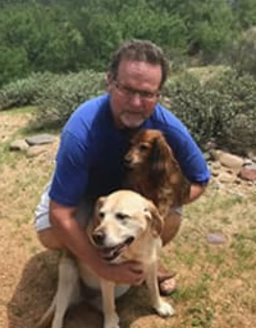 Dr. Tim Halstead with two dogs
